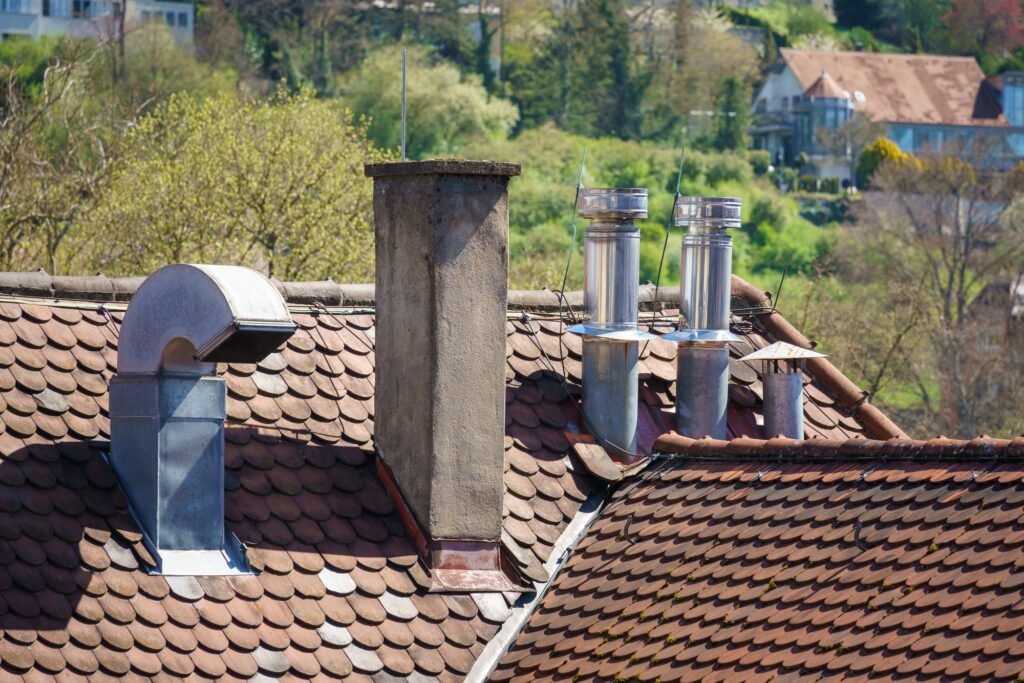 Roof with different chimneys